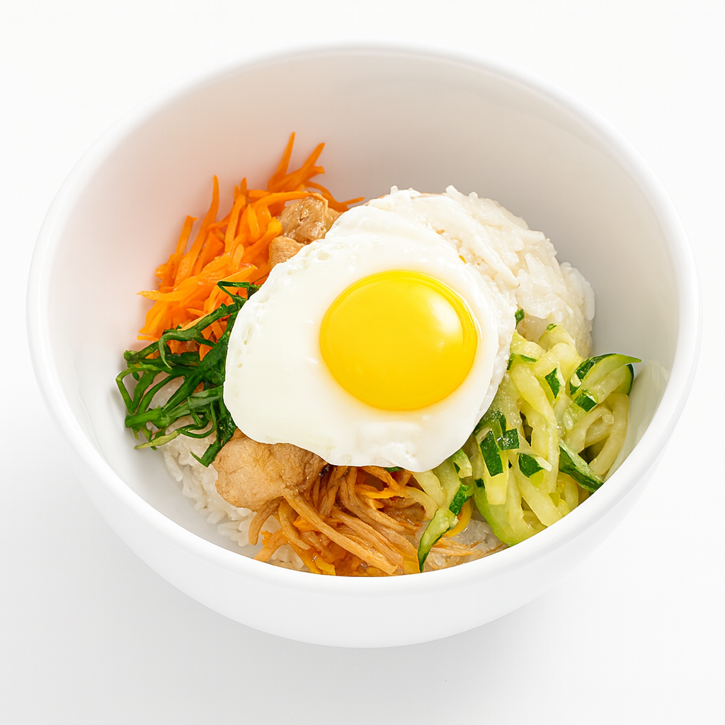 Bibimbap, a Korean rice bowl, topped with an egg served at Cana Korean Restaurant