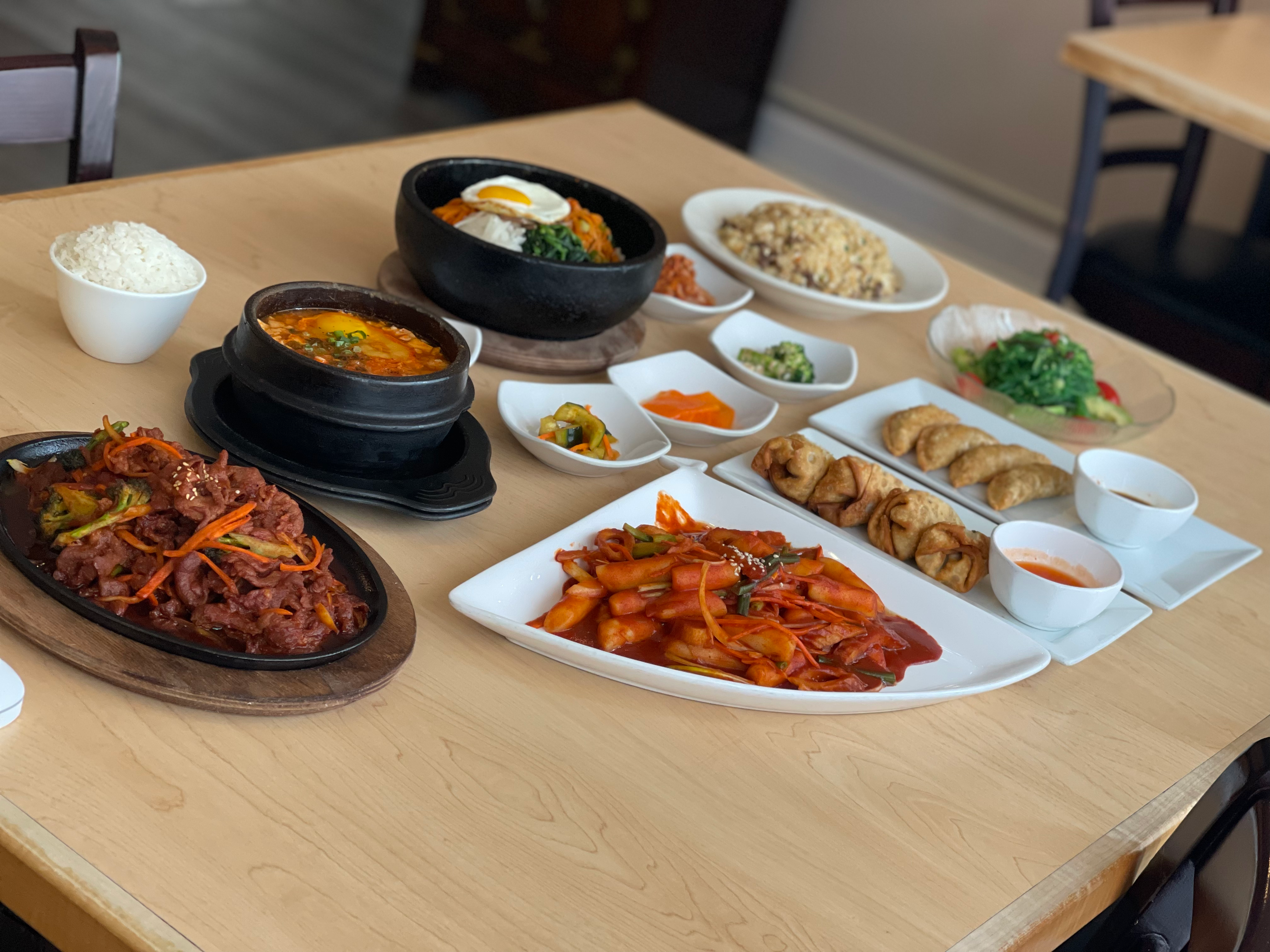 A spread of traditional Korean dishes at Cana Korean Restaurant