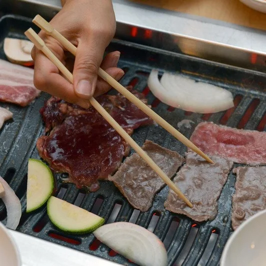 Hang grilled Korean BBQ meats at Cana Korean Restaurant